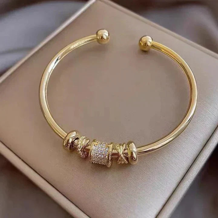Elegant Adjustable Bracelet with Sophisticated Golden Charms